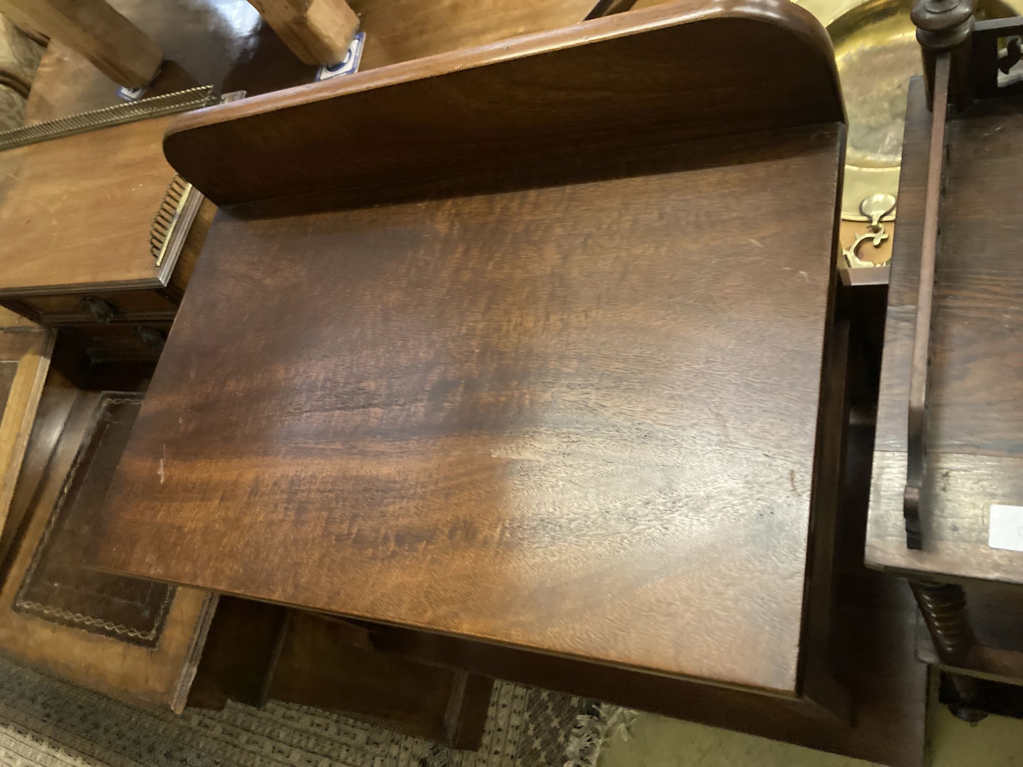 A near pair of mahogany luggage racks, larger 76 x 44cm height 66cm